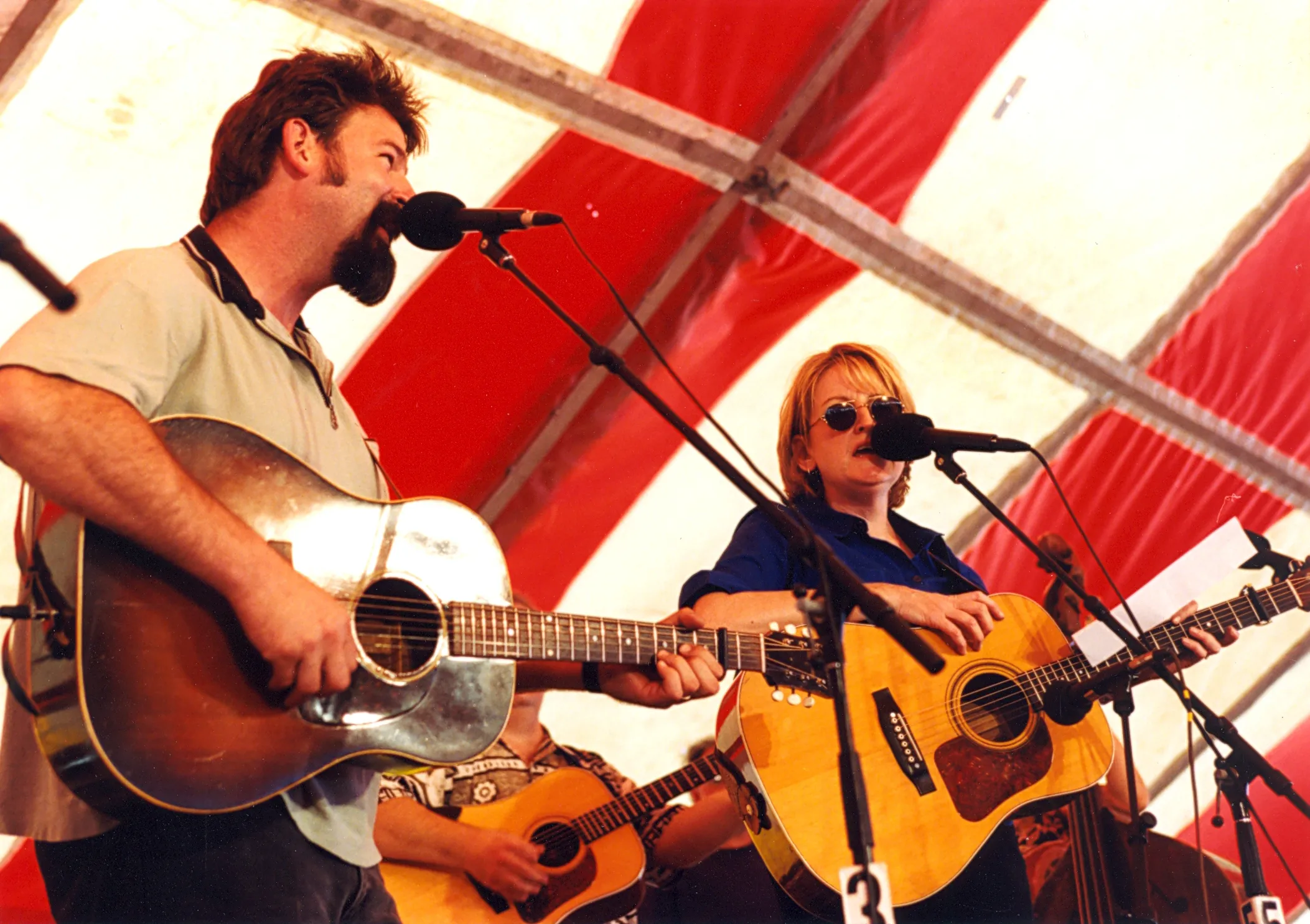 with Claire Lynch, singing a duet at Wheatland Music Festival, Remus, MI